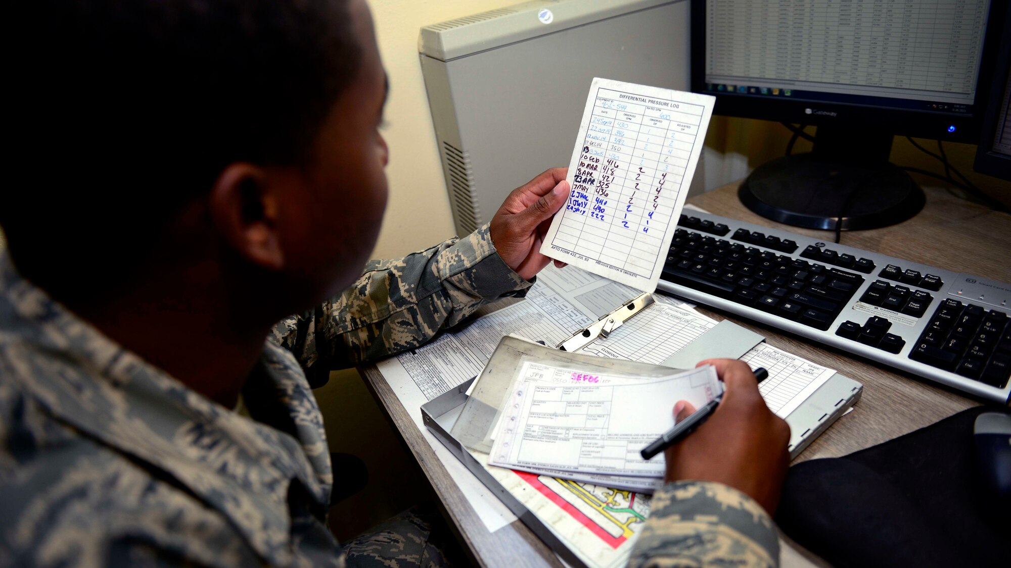 U.S. Air Force Senior Airman Kenneth Fuller III, 31st Logistics Readiness Squadron petroleum oils and lubricants fuels service center controller, prepares to dispatch a fuel truck to the flight line, Aug. 26, 2015, at Aviano Air Base, Italy. Airmen from POL are responsible for receiving, storing and tracking all petroleum products used by government vehicles and aircraft. (U.S. Air Force photo by Senior Airman Areca T. Wilson/Released)