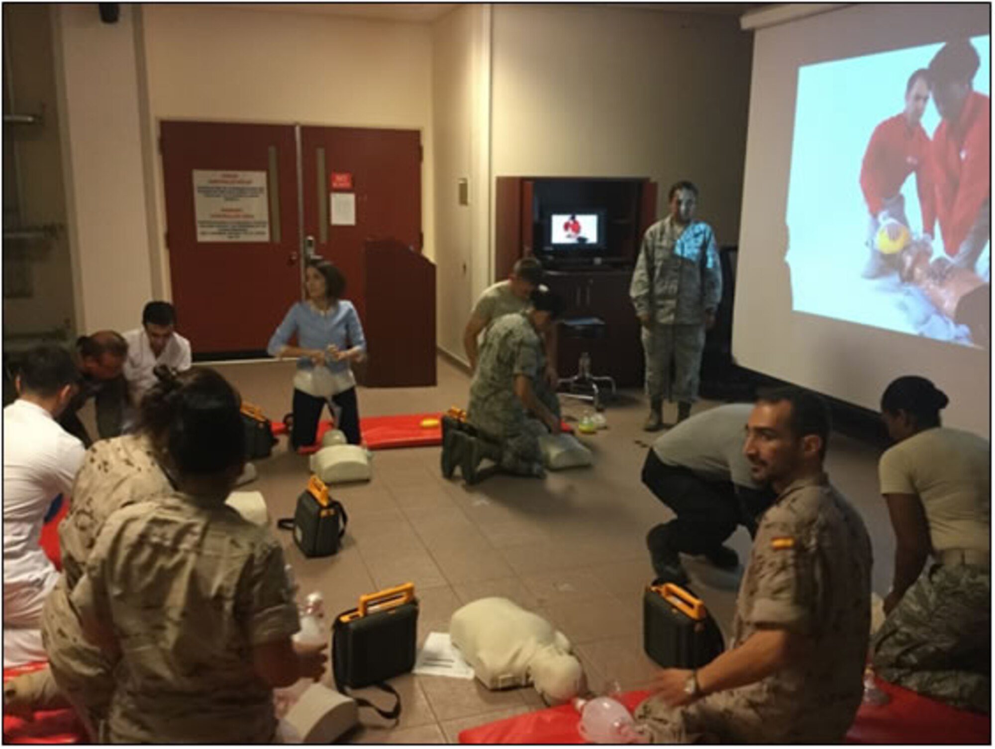 Medical professionals from the United States Air Force, Spanish Army, and Turkish medical staff from medical facilities located in the ciy of Adana participate in a Basic Life Support Course for Healthcare Providers training at the 39th Medical Group, August 5, 2015 at Incirlik Air Base, Turkey. The training focused on performing qualified first-aid for heart attacks in adults and children, by using techniques in order to restore spontaneous breathing and circulation (Photo by Spanish Army Private Jose Linares)