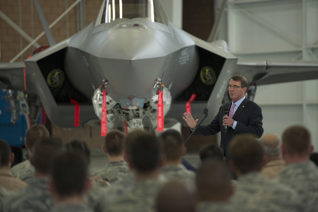 Defense Secretary Ash Carter speaks with service members while visiting Nellis Air Force Base, Nev., Aug. 26, 2015. DoD photo by Air Force Master Sgt. Adrian Cadiz