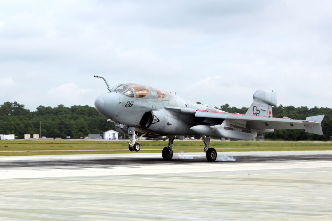 An EA-6B Prowler lands for a “touch and go” takeoff during Marine Tactical Electronic Warfare Training Squadron 1’s last flight operations for the Prowler at Marine Corps Auxiliary Landing Field Bogue, Aug. 20, 2015. Four student pilots are among the last to learn how to fly the Prowler due to its transitioning out of the Marine Corps starting in 2016.