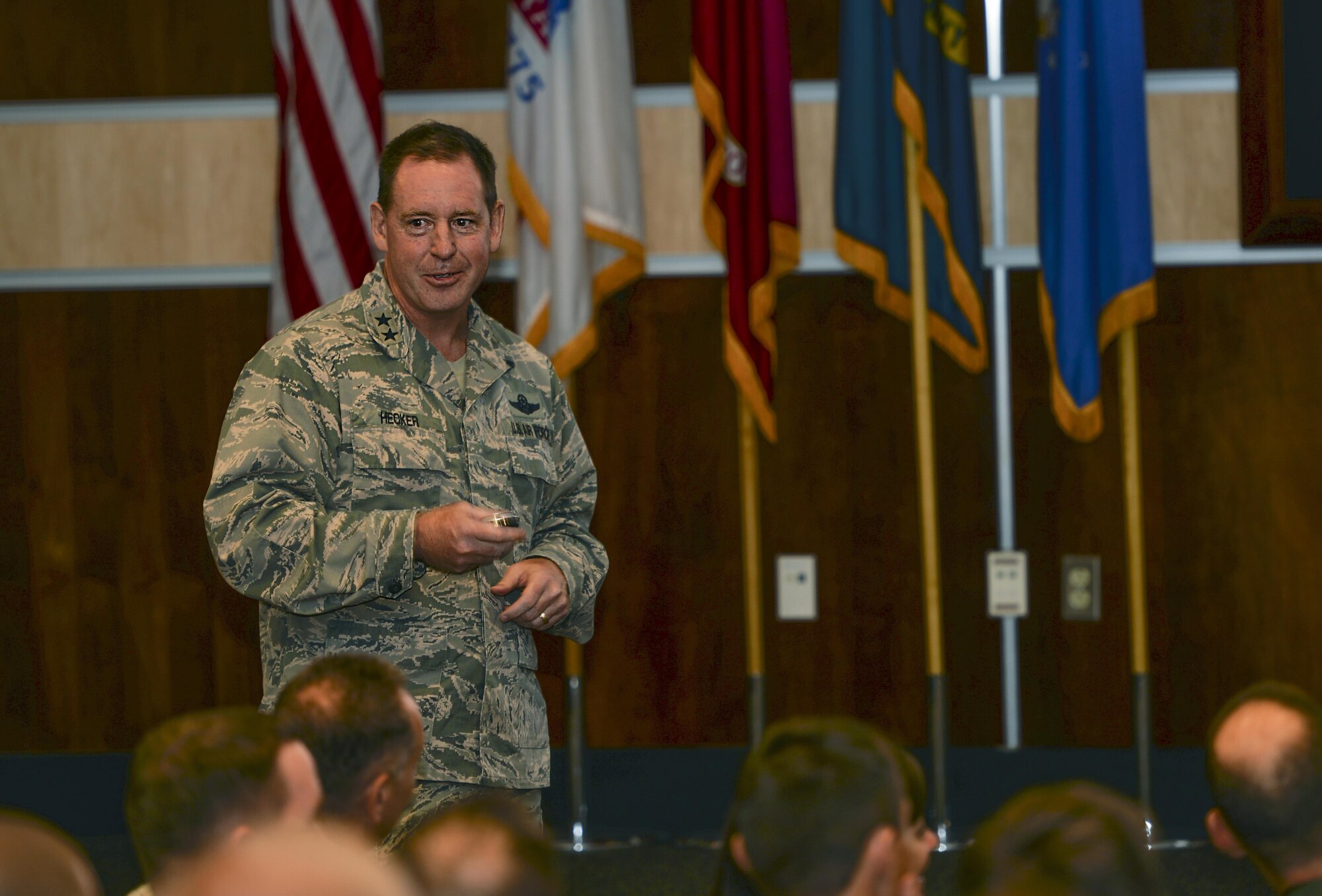 Maj. Gen. James Hecker, 19th Air Force commander, held an All Call at the 33rd Fighter Wing at Eglin Air Force Base, Fla., Aug. 19, 2015. Hecker visited the wing to gain local insight on major training programs and to hear updates on the F-35 program from Airmen and leadership. (U.S. Air Force Photo/Senior Airman Andrea Posey)