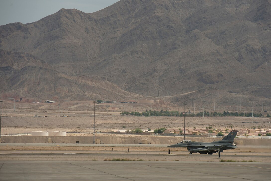 An F-16 prepares to take off during a Red Flag Exercise as Defense Secretary Ash Carter visits Nellis Air Force Base, Nev., Aug. 26, 2015. DoD photo by U.S. Air Force Master Sgt. Adrian Cadiz