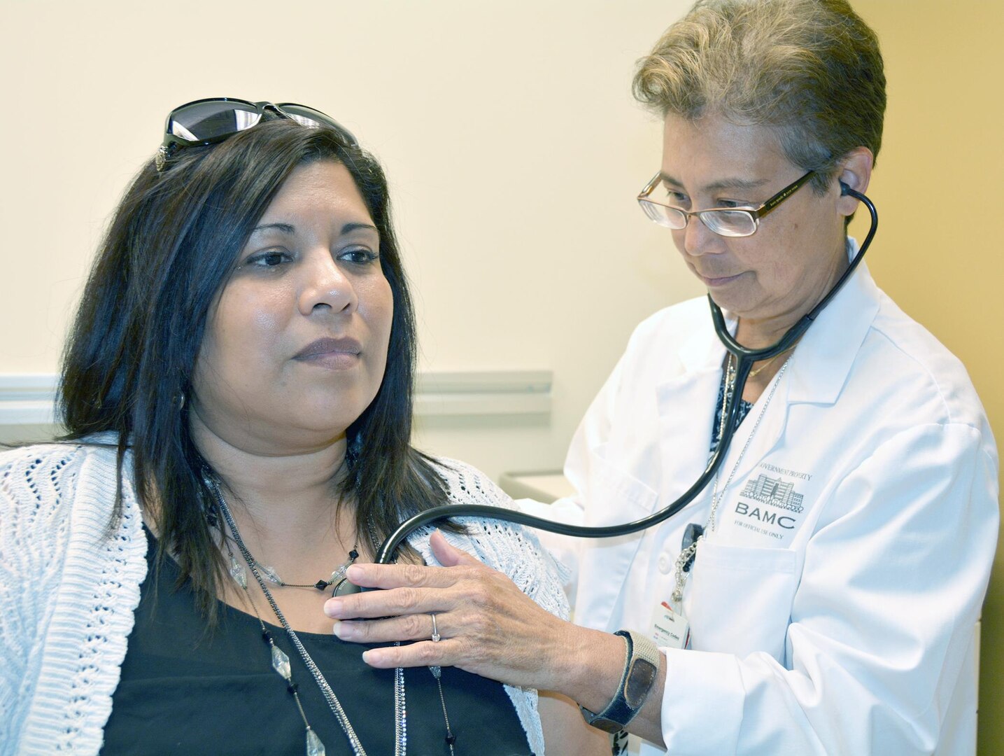 Dr. Kathryn Joyce, nurse practitioner, examines Irene Fuentez Aug. 18 at the new Westover Medical Home.