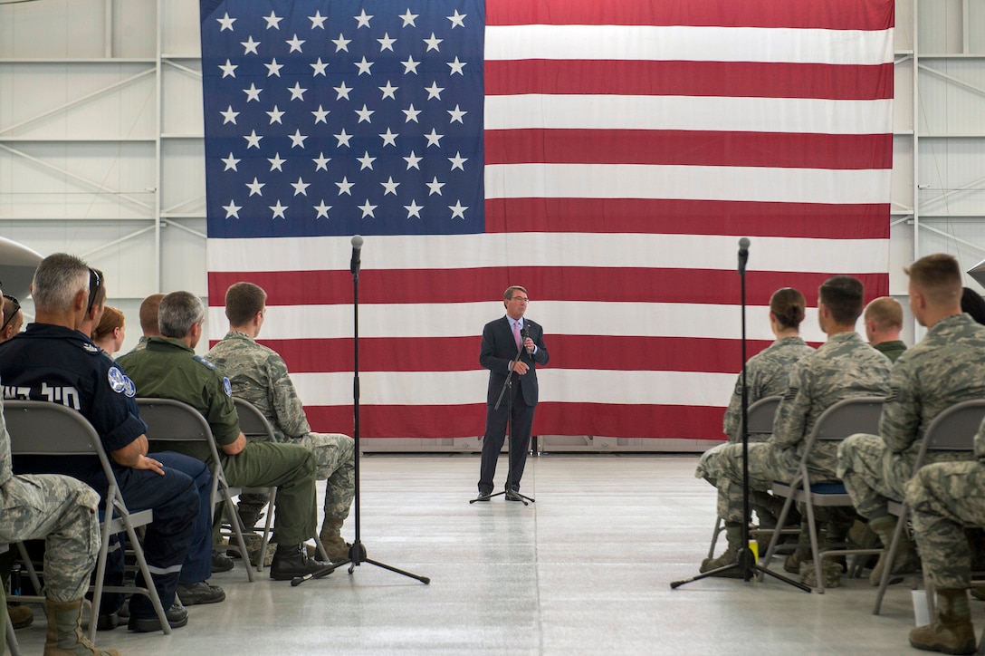 Defense Secretary Ash Carter speaks with airman on Nellis Air Force Base, Nev., Aug. 26, 2015. DoD photo by U.S. Air Force Master Sgt. Adrian Cadiz