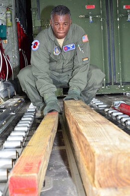 Master Sgt. Troy Bickham, a loadmaster with the 53rd Weather Reconnaissance Squadron, Keesler Air Force Base, Mississippi, preps the back of a WC-130J before a deployment to the Caribbean to gather storm data in Hurricane Danny for the National Hurricane Center, Aug. 19, 2015. The Hurricane Hunters completed the last mission for Danny Aug. 24, 2015, and started flying into Tropical Storm Erika Aug. 25, 2015, and moved their operations to Homestead Air Reserve Base, Florida, Aug. 26, 2015, as Erika is projected to impact St. Croix, in the U.S. Virgin Islands, the forward operating location for the 53rd WRS. (U.S. Air Force Photo/Master Sgt. Brian Lamar) 