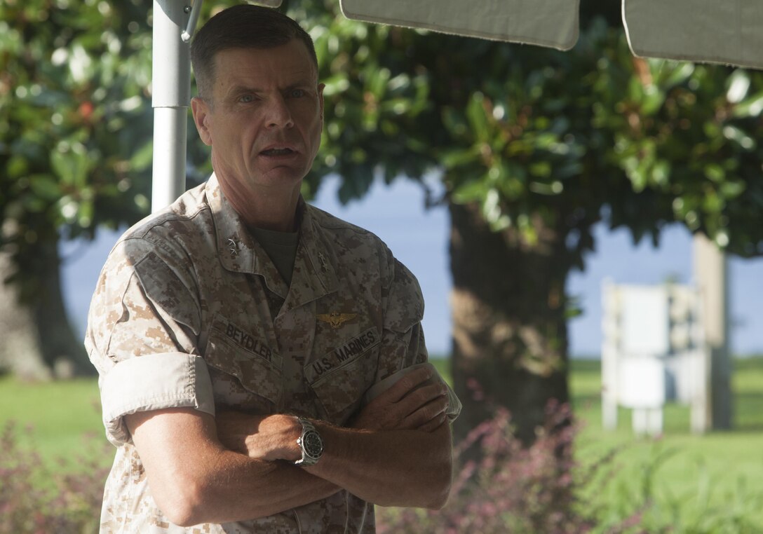 U.S. Marine Corps Brig. Gen. William D. Beydler, II Marine Expeditionary Force (II MEF) Commanding General, delivers his remarks on the Protect What You've Earned campaign on Camp Lejeune, N.C., Aug. 25, 2015. The campaign was created to encourage Marines to make the right decisions on and off duty. (U.S. Marine Corps photo by Lance Cpl. Sarah L. Blendowski, 2DMARDIV Combat Camera/Released)