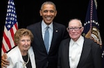 Donna and Calvin Andrew, the parents of Nansi Malesic, an employee at the DLA Document Services White House production facility, pose for a picture with President Barack Obama in Utah. The Andrews met Obama after their daughter commented to members of the White House Office of the Staff Secretary that she could fly home when they went to Utah. 