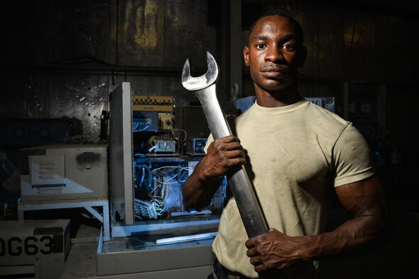 Senior Airman Dominique is an aerospace ground equipment mechanic assigned to the 380th Expeditionary Maintenance Squadron at an undisclosed location in Southwest Asia. As an AGE mechanic, Dominique is responsible for maintaining equipment that supplies electricity, as well hydraulic pressure and air conditioning, to aircraft. (U.S. Air Force photo/Tech. Sgt. Christopher Boitz)