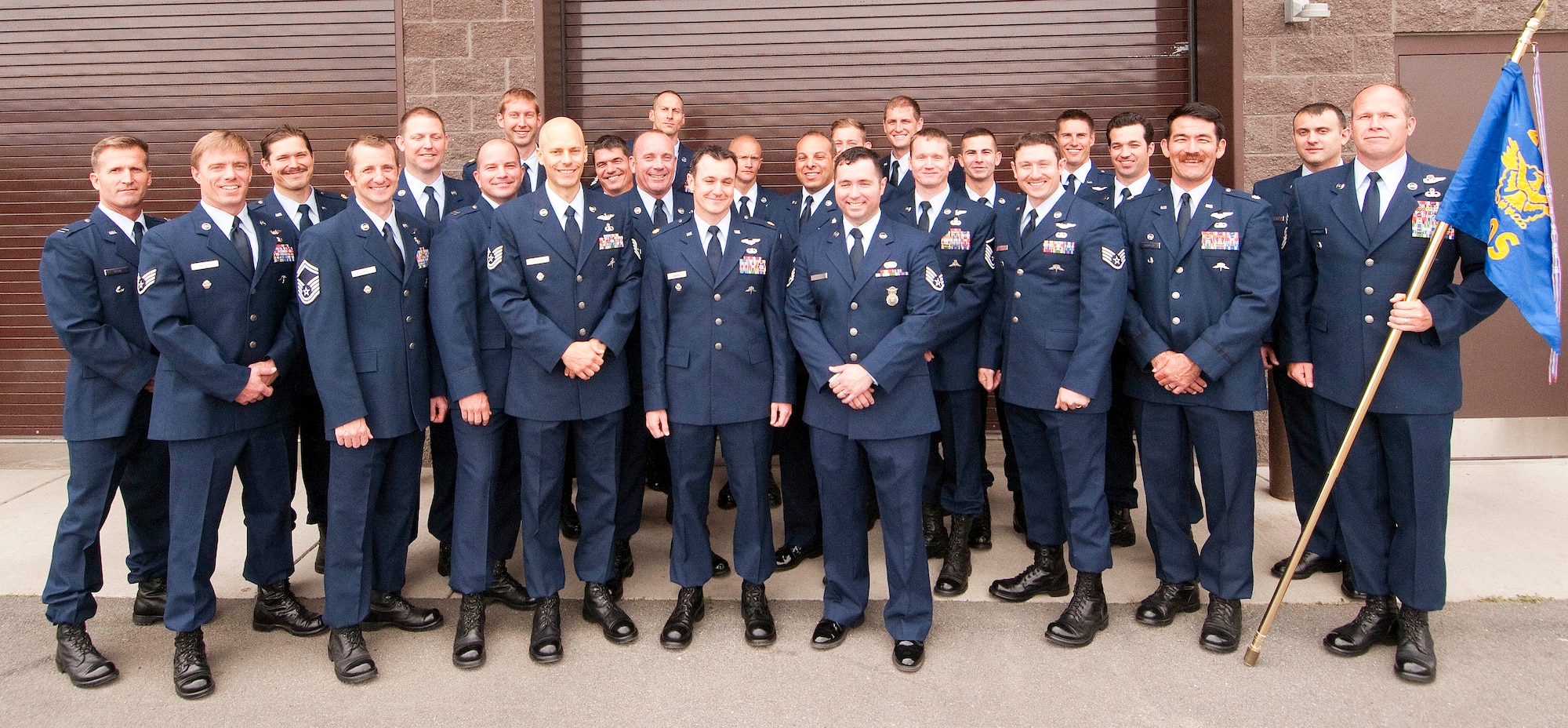 Members of the Alaska Air National Guard's elite 212th Rescue Squadron pose for a group photo after a change-of-command ceremony on Joint Base Elmendorf Richardson Aug. 27, 2015. National Guard photo by Capt. John Callahan.