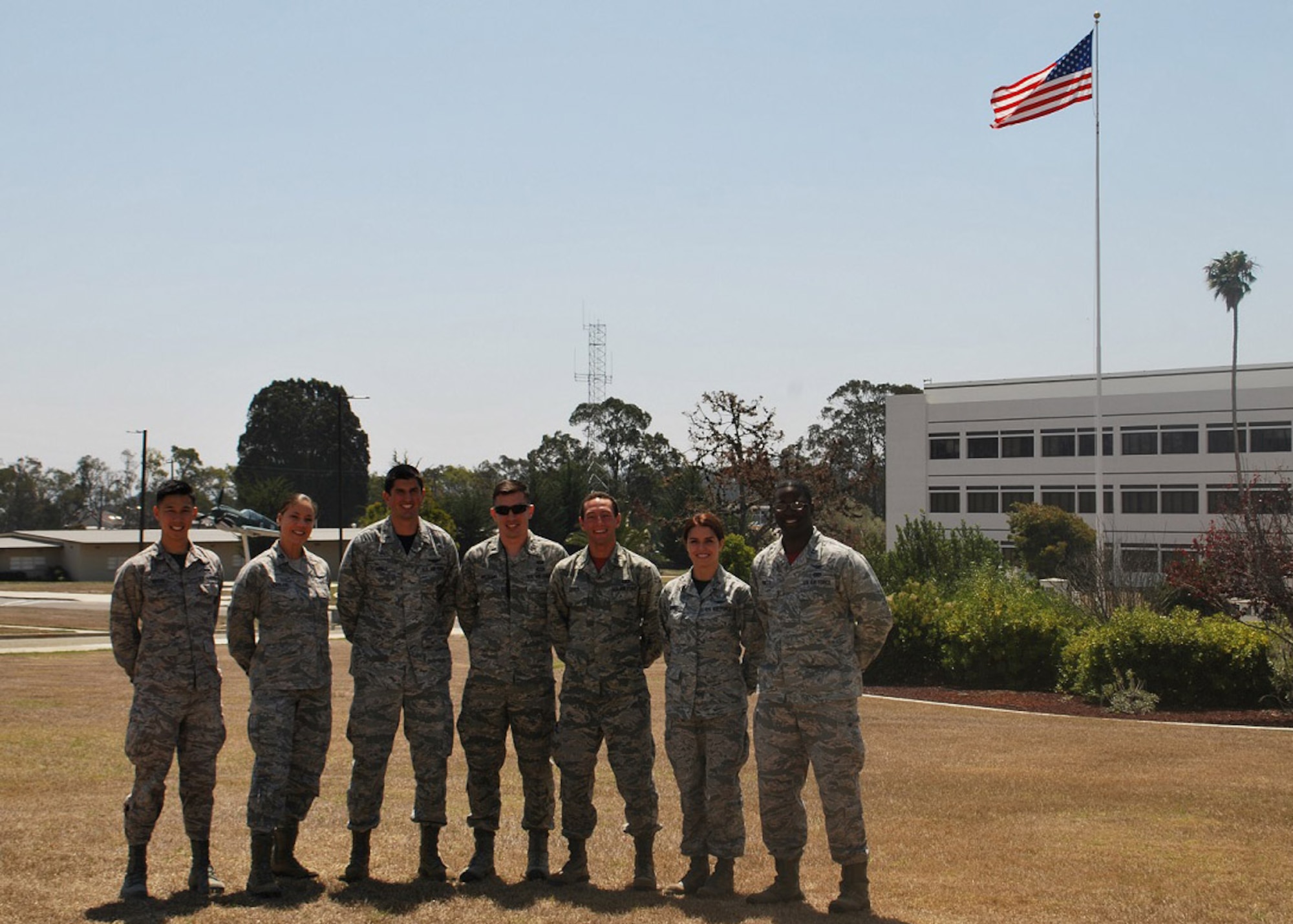 The Company Grade Officers Council executives pose in front of the headquarters building recently (From left) 1st Lt. Chris Huynh, 2nd Range Operations Squadron, CGOC publicity officer, Capt. Laura England, 533rd Training Squadron, CGOC professional development chair, 1st Lt. Jonathan Schirner, 30th Space Wing, CGOC vice president, 1st Lt. Ross Malugani, 614th Air Operations Center, CGOC fundraising chair, 1st Lt. Ben Fried 4th Space Launch Squadron, CGOC Treasurer, 2nd Lt. Casey Gomez, 2nd ROPS, CGOC social chair, Capt. Kelson Nisbett, 381st Training Support Squadron, CGOC president, Vandenberg Air Force Base, Calif. (Courtesy photo)

