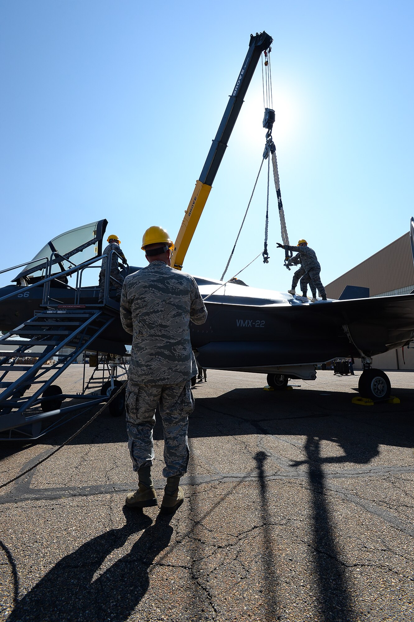 Airmen assigned to the 388th Equipment Maintenance Squadron prepare an F-35B aircraft for a simulated sling lift during Crash Damaged Disabled Aircraft Recovery Program training at Hill Air Force Base, Utah, Thursday, Aug. 27, 2015. Training was provided by an F-35 depot team assigned to the 570th Aircraft Maintenance Squadron at Hill and personnel from Edwards AFB, Calif. The training ensures Hill Airmen are prepared for the base’s future operational F-35 mission. Firefighters and explosive ordnance disposal personnel also participated in the CDDARP training. (U.S. Air Force photo by R. Nial Bradshaw/Released)