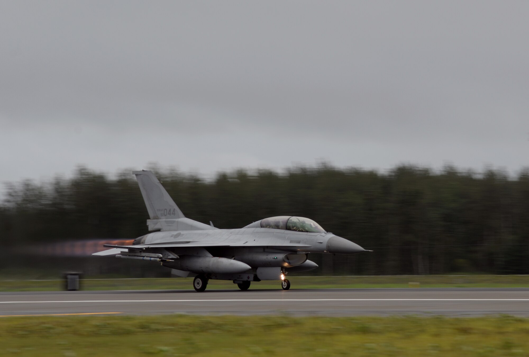 A Republic of Korea Air Force (ROKAF) F-16D Fighting Falcon takes off from Eielson Air Force Base, Alaska, Aug. 10, 2015, during RED FLAG-Alaska (RF-A) 15-3. ROKAF and Japan Air Self-Defense Force units are deployed to Eielson along with assorted tanker, transport, fighter and electronic warfare aircraft and support personnel from various service branches for RF-A, a series of Pacific Air Forces commander-directed field training exercises for U.S. and partner nation forces, providing combined offensive counter-air, interdiction, close air support, and large force employment training in a simulated combat environment. (U.S. Air Force photo by Master Sgt. Karen J. Tomasik/Released)