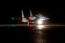 An F-15E Strike Eagle taxies in preparation of take-off during an employment exercise 26 August 2015, Seymour Johnson Air Force Base, North Carolina. Exercise Coronet Warrior 15-01, was designed to test and practice Airmen’s ability to respond to threats anytime, anywhere. (U.S. Air Force photo/Master Sgt. Jocelyn L. Rich-Pendracki)
