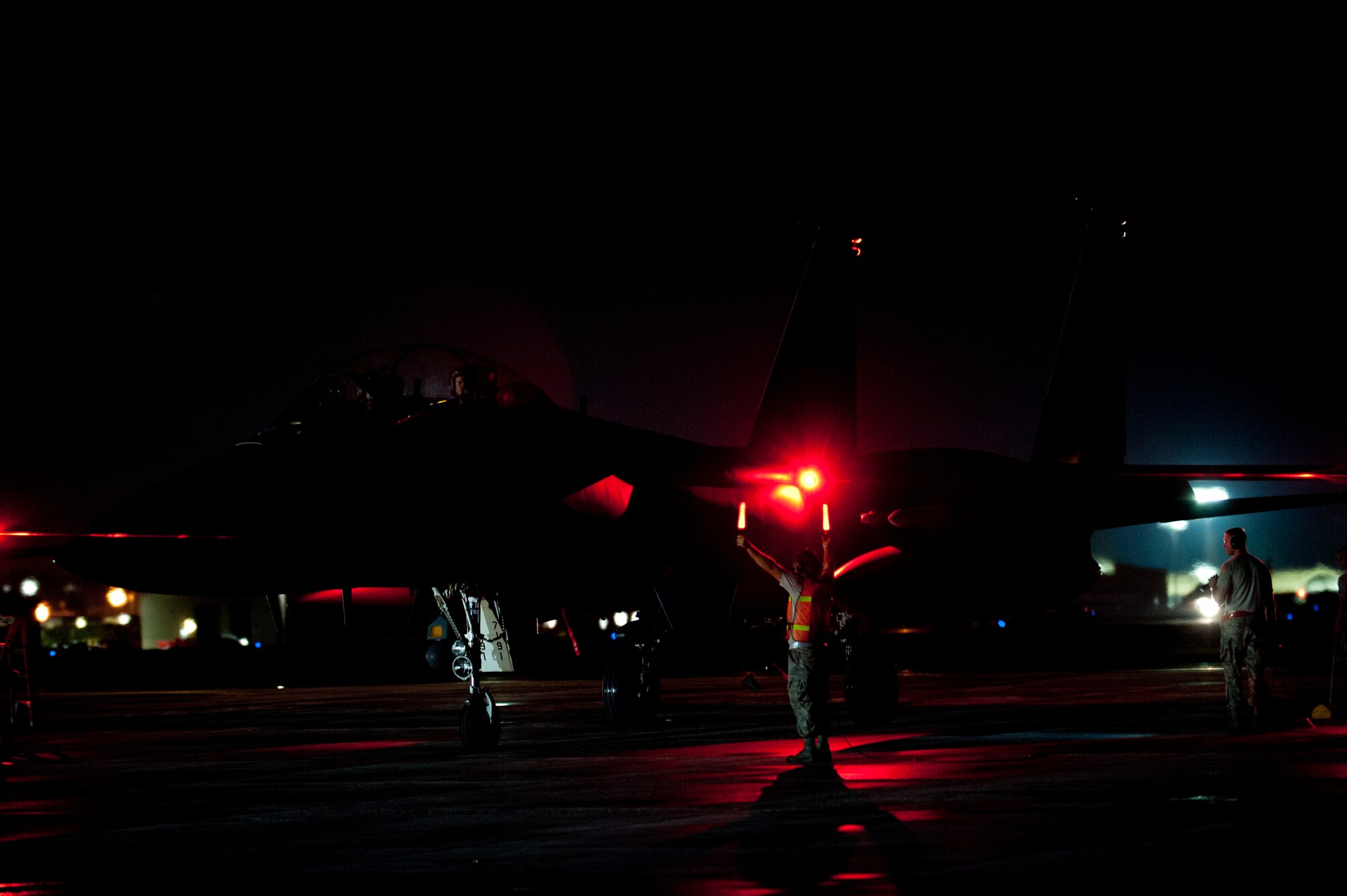 Aircraft maintainers perform a final, overall inspection of F-15E Strike Eagles just before they take off as part of an employment exercise 26 August 2015, Seymour Johnson Air Force Base, North Carolina. Exercise Coronet Warrior 15-01, was designed to test and practice Airmen’s ability to respond to threats anytime, anywhere. (U.S. Air Force photo/Master Sgt. Jocelyn L. Rich-Pendracki)