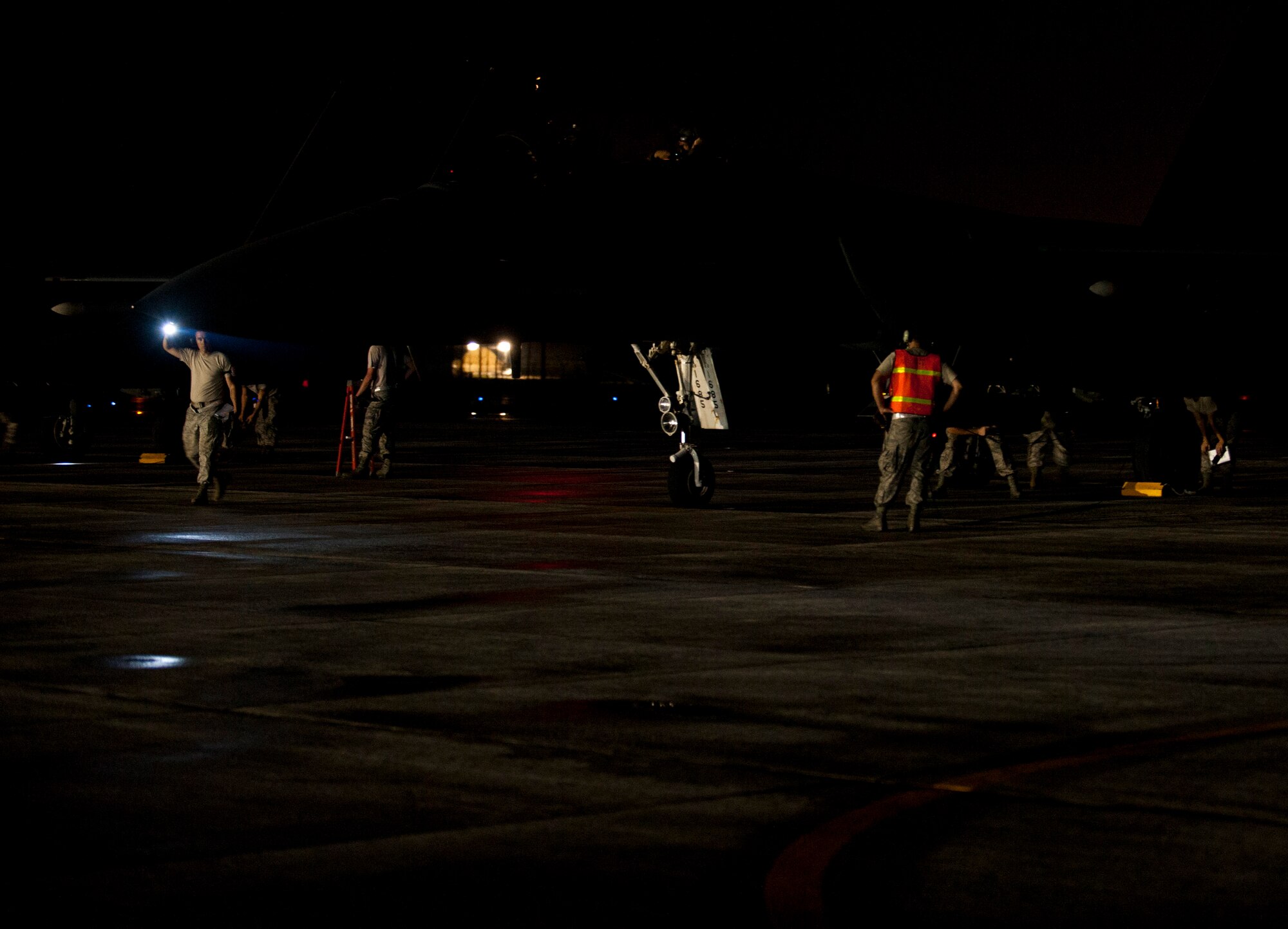 Aircraft maintainers perform a final, overall inspection of F-15E Strike Eagles just before they take off as part of an employment exercise 26 August 2015, Seymour Johnson Air Force Base, North Carolina. Exercise Coronet Warrior 15-01, was designed to test and practice Airmen’s ability to respond to threats anytime, anywhere. (U.S. Air Force photo/Master Sgt. Jocelyn L. Rich-Pendracki)