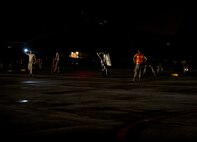 Aircraft maintainers perform a final, overall inspection of F-15E Strike Eagles just before they take off as part of an employment exercise 26 August 2015, Seymour Johnson Air Force Base, North Carolina. Exercise Coronet Warrior 15-01, was designed to test and practice Airmen’s ability to respond to threats anytime, anywhere. (U.S. Air Force photo/Master Sgt. Jocelyn L. Rich-Pendracki)