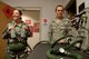 Staff Sgt. Amanda Armenti, 4th Medical Group bioenvironmental engineer, laughs as she experiences a G-Suit for the first time with the help of Staff Sgt. Dain Boelter, 4th Operations Squadron life support technician, as a part of an impromptu tour of the 333rd Fighter Squadron, 26 Aug 2015, at Seymour Johnson Air Force Base, North Carolina. This tour was part in an initiative by Col. Mark Slocum, 4th Fighter Wing commander, to get Airmen out to the fighter squadrons and flightline, who otherwise don’t get the chance.  (U.S. Air Force photo/Master Sgt. Jocelyn L. Rich-Pendracki)