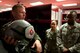 Lieutenant Col.  Frederick Haley III,  333rd Fighter Squadron commander, familiarizes bioenvironmental engineers from the 4th Medical Group with life support equipment during an impromptu tour of his squadron, 26 Aug 2015, at Seymour Johnson Air Force Base, North Carolina.  This tour was part of an initiative by Col. Mark Slocum, 4th Fighter Wing commander, to get Airmen out to the fighter squadrons and flightline, who otherwise don’t get the chance.  Although the primary mission if the U.S. Air Force is to “Fly, Flight & Win” there are many Airmen that support the flying mission from afar.  “It's great to get these Airmen near the flying mission, who normally don't get to see it up close” said Slocum. (U.S. Air Force photo/Master Sgt. Jocelyn L. Rich-Pendracki)