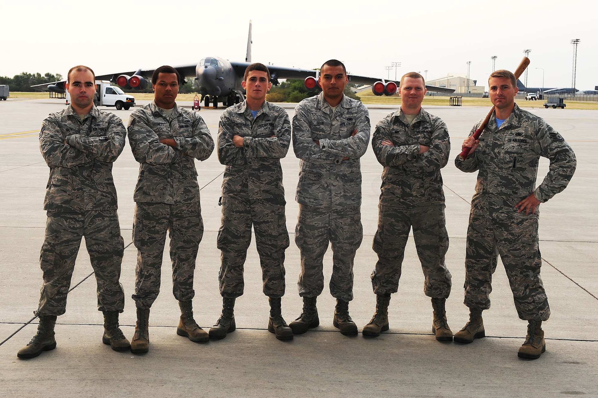 From left to right, Senior Airman Cody Guy, Senior Airman Jordan Everett, Senior Airman Cody Montgomery, Senior Airman Julio Solis, Staff Sgt. Michael Way and Tech. Sgt. James Johnson, 705th Munitions Squadron maintenance special weapons re-entry system/re-entry vehicle section, pose in front of a B-52H Stratofortress at Minot Air Force Base, N.D., Aug. 21, 2015. The team has two members who competed in the Global Strike Challenge last year; the team came in a very close second place. This year, the team plans to take home the trophy. They are very confident and believe they have the most efficient team--exceeding all expectations. (U.S. Air Force photo / Senior Airman Kristoffer Kaubisch)