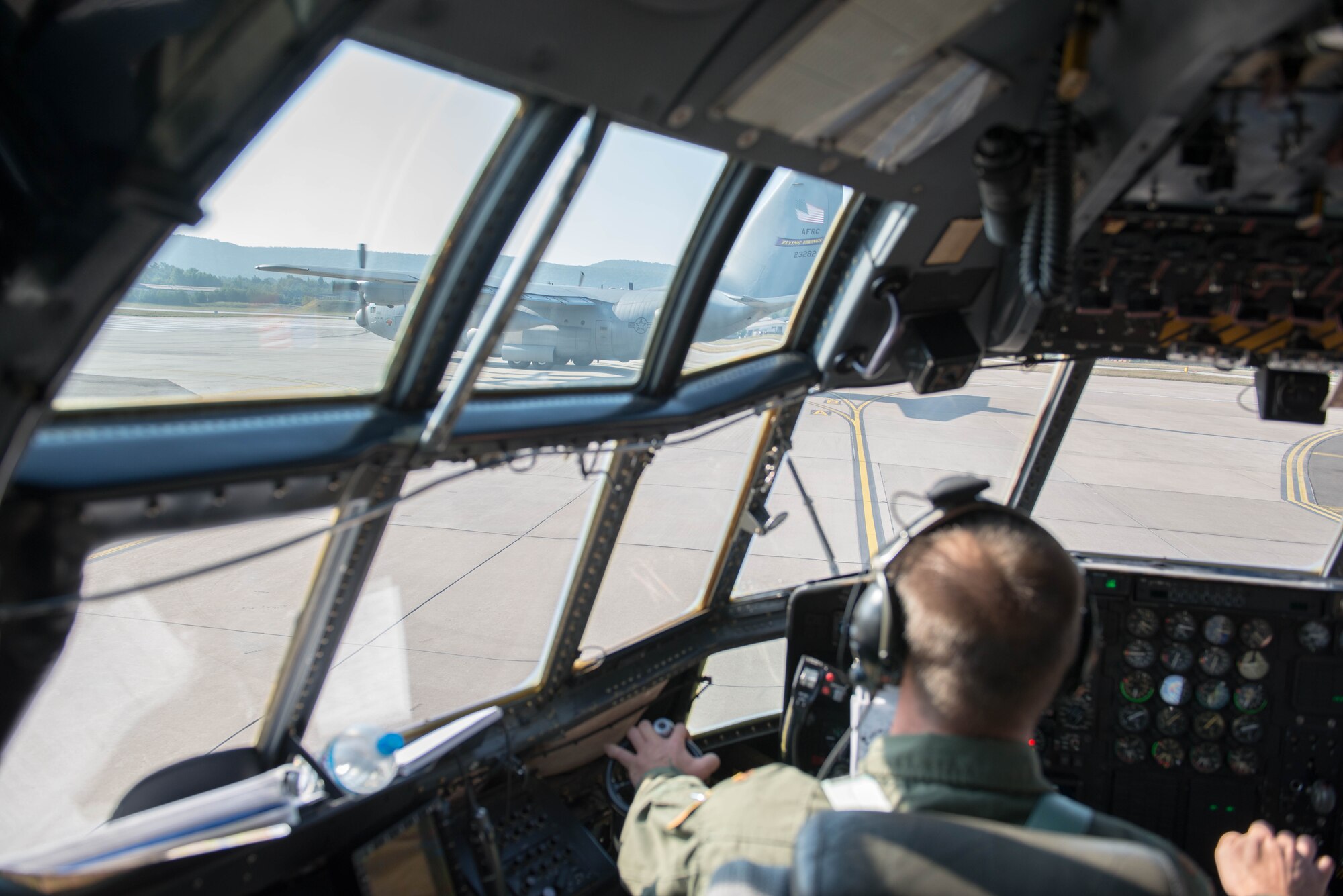 Maj. Rob Rettig, a pilot with the 96th Airlift Squadron in Minneapolis, taxis on the runway prior to departure at Ramstein AB, Germany during exercise Swift Response 15. (U.S. Air Force photo by Staff Sgt. Trevor Saylor/Released)
