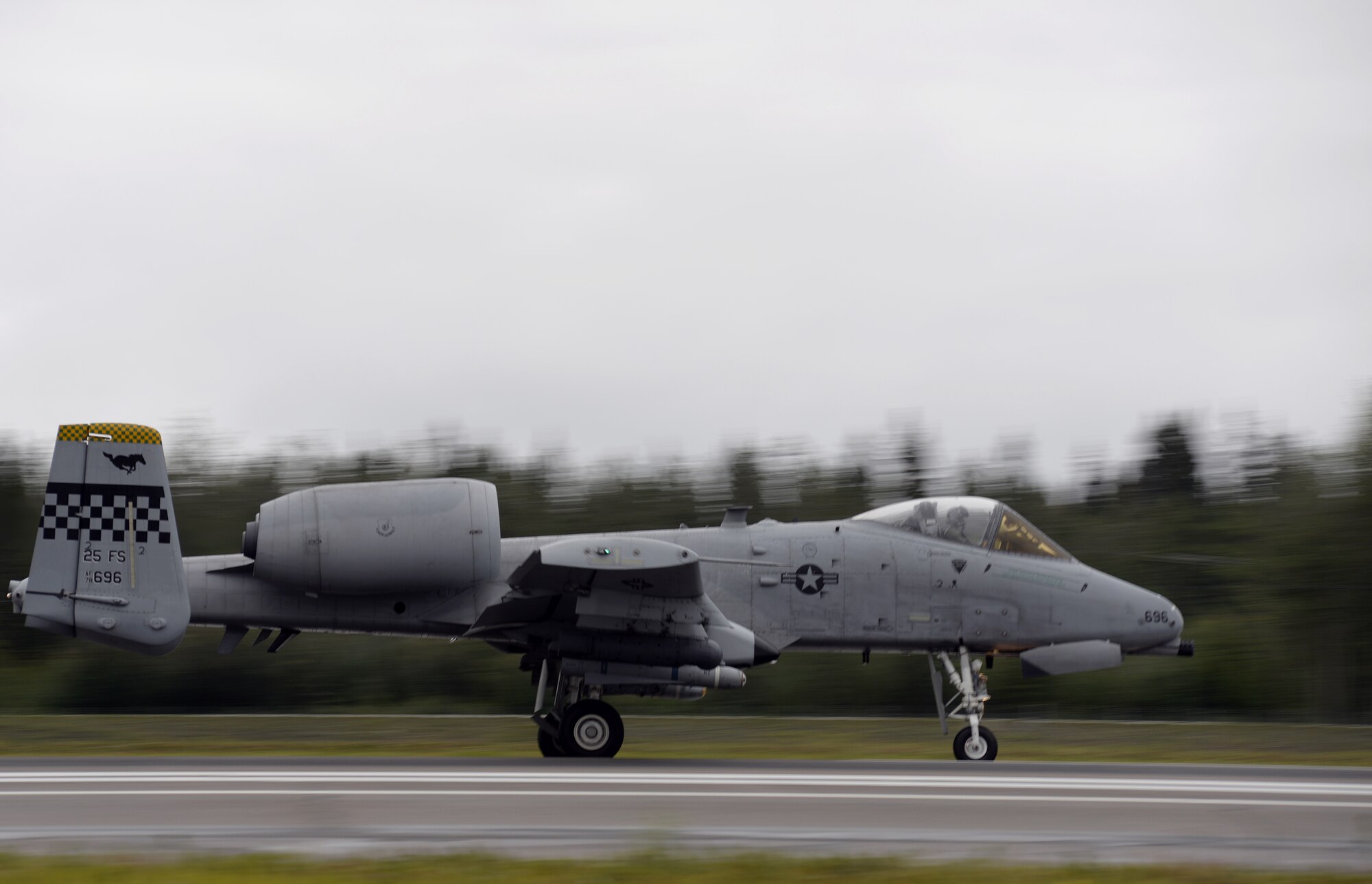 U.S. Air Force A-10 Thunderbolt II with the 25th Fighter Squadron from Osan Air Base, Republic of Korea, takes off from Eielson Air Force Base, Alaska, Aug. 10, 2015, to participate in the first simulated combat sortie of RED FLAG-Alaska (RF-A) 15-3. The Osan A-10s, as well as several F-16 Fighting Falcons from Osan's 36th Fighter Squadron, are deployed to Eielson for RF-A, a series of Pacific Air Forces commander-directed field training exercises for U.S. and partner nation forces, providing combined offensive counter-air, interdiction, close air support, and large force employment training in a simulated combat environment. (U.S. Air Force photo by Master Sgt. Karen J. Tomasik/Released)