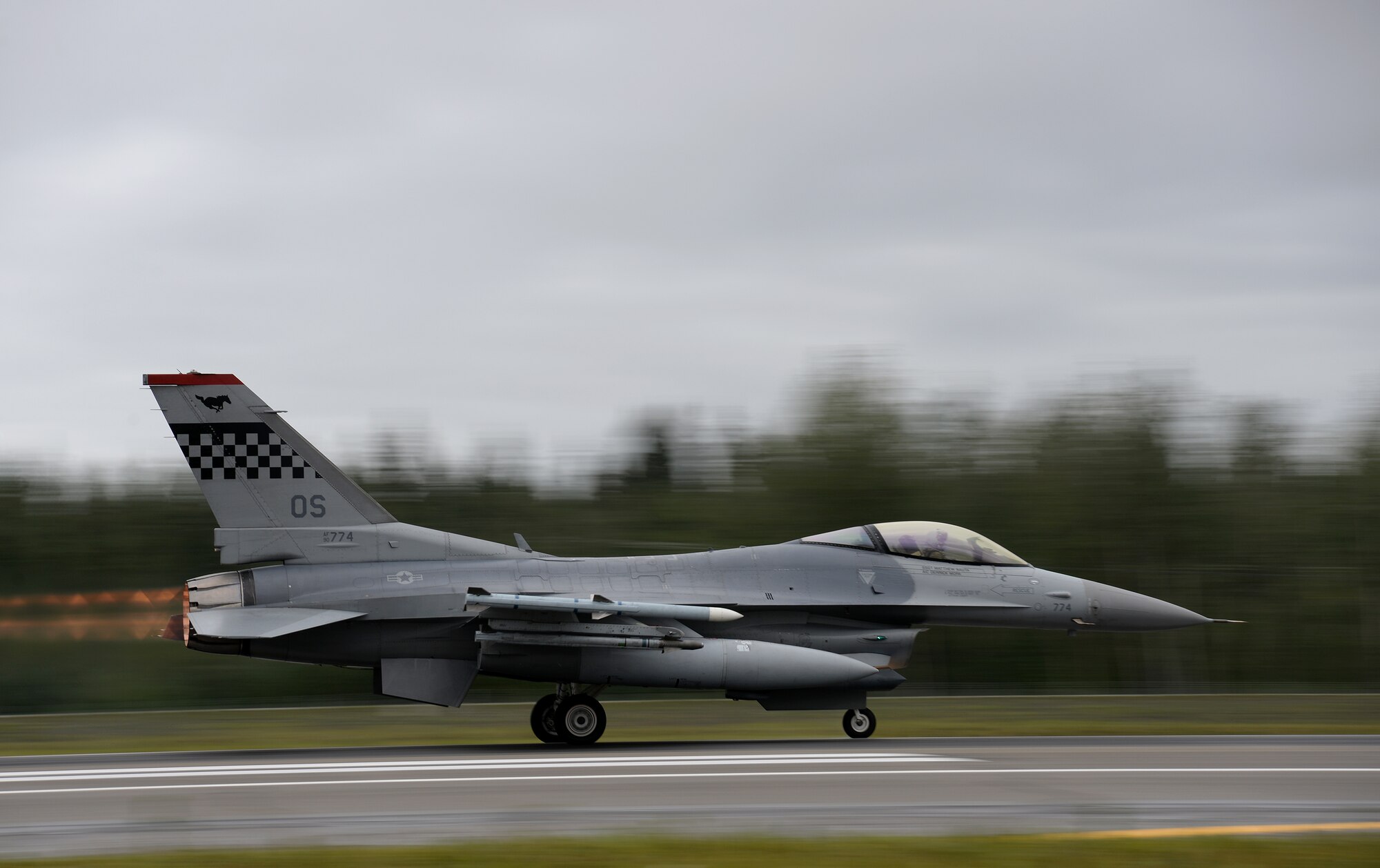 A U.S. Air Force F-16 Fighting Falcon assigned to the 36th Fighter Squadron from Osan Air Base, Republic of Korea, takes off from Eielson Air Force Base, Alaska, Aug. 10, 2015, during RED FLAG-Alaska (RF-A) 15-3. The Osan F-16s, as well as several A-10 Thunderbolt II aircraft from Osan's 25th Fighter Squadron, are deployed to Eielson for RF-A, a series of Pacific Air Forces commander-directed field training exercises for U.S. and partner nation forces, providing combined offensive counter-air, interdiction, close air support and large force employment training in a simulated combat environment. (U.S. Air Force photo by Master Sgt. Karen J. Tomasik/Released)