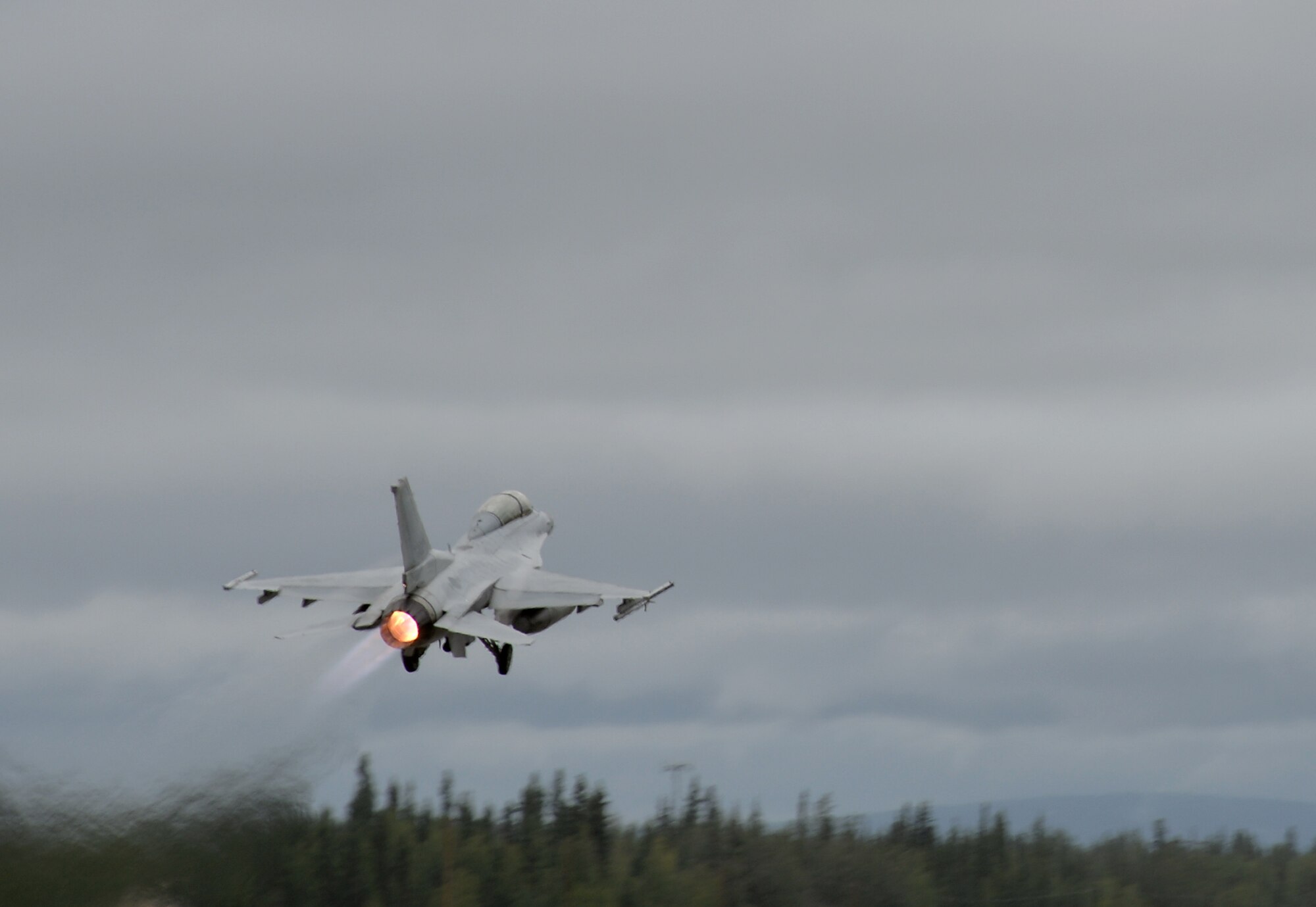 A Republic of Korea Air Force (ROKAF) F-16D Fighting Falcon takes off from Eielson Air Force Base, Alaska, Aug. 10, 2015, during RED FLAG-Alaska (RF-A) 15-3. ROKAF and Japan Air Self-Defense Force units are deployed to Eielson along with assorted tanker, transport, fighter and electronic warfare aircraft and support personnel from various service branches for RF-A, a series of Pacific Air Forces commander-directed field training exercises for U.S. and partner nation forces, providing combined offensive counter-air, interdiction, close air support, and large force employment training in a simulated combat environment. (U.S. Air Force photo by Master Sgt. Karen J. Tomasik/Released)