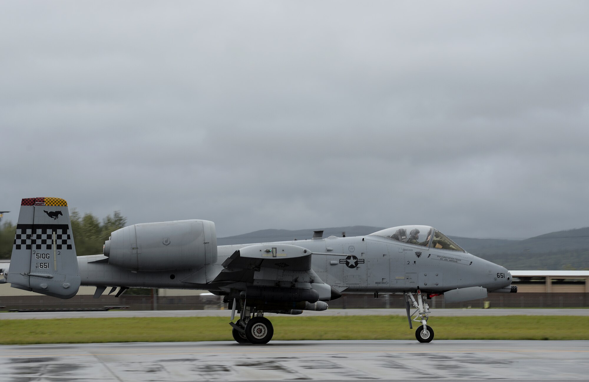 A U.S. Air Force A-10 Thunderbolt II aircraft with the 25th Fighter Squadron from Osan Air Base, Republic of Korea, taxis to Eielson Air Force Base, Alaska, runway Aug. 10, 2015, for launch during the first simulated combat sortie of RED FLAG-Alaska (RF-A) 15-3. The Osan A-10s, as well as several F-16 Fighting Falcons from Osan's 36th Fighter Squadron, are deployed to Eielson for RF-A, a series of Pacific Air Forces commander-directed field training exercises for U.S. and partner nation forces, providing combined offensive counter-air, interdiction, close air support, and large force employment training in a simulated combat environment. (U.S. Air Force photo by Master Sgt. Karen J. Tomasik/Released)