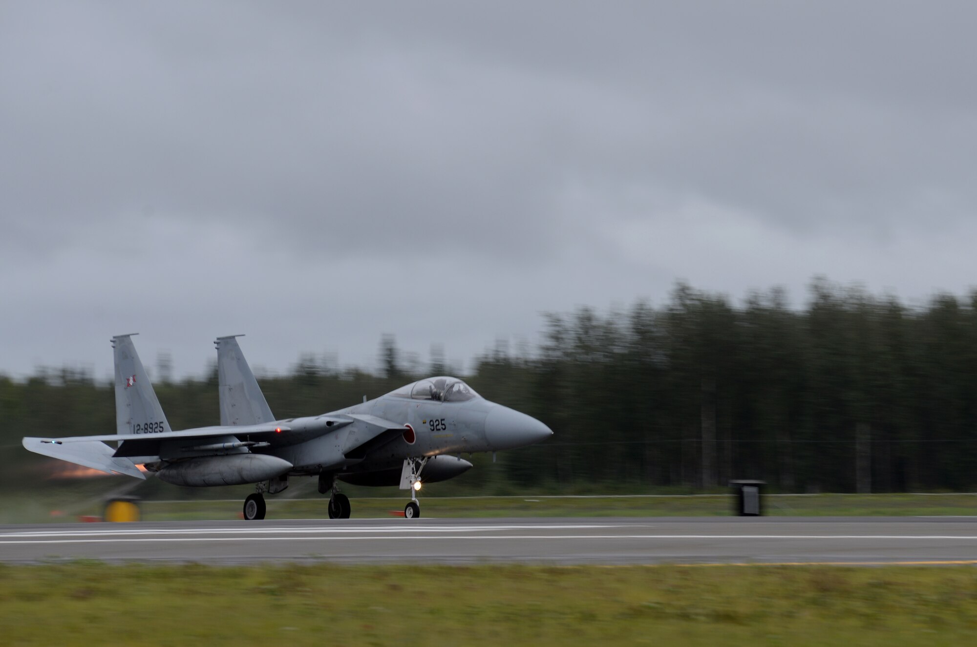 A Japan Air Self-Defense Force (JASDF) F-15J Eagle takes off from Eielson Air Force Base, Alaska, Aug. 10, 2015, during RED FLAG-Alaska (RF-A) 15-3. JASDF and Republic of Korea Air Force units are deployed to Eielson along with assorted tanker, transport, fighter and electronic warfare aircraft and support personnel from multiple U.S. service branches for RF-A, a series of Pacific Air Forces commander-directed field training exercises for U.S. and partner nation forces, providing combined offensive counter-air, interdiction, close air support, and large force employment training in a simulated combat environment. (U.S. Air Force photo by Master Sgt. Karen J. Tomasik/Released)
