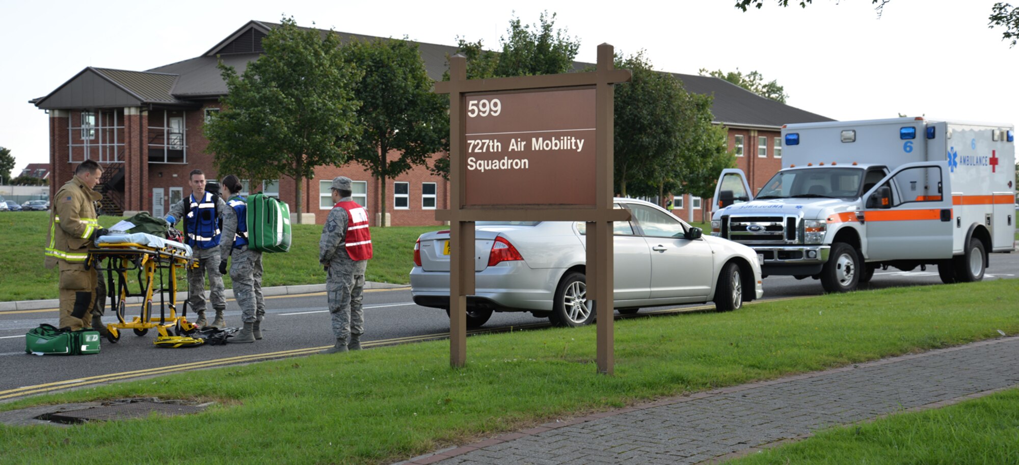 Emergency responders prepare to enter a building after a simulated active shooter incident during an exercise Aug. 25, 2015, on RAF Mildenhall, England. The exercise tested 100th Security Forces Squadron, 100th Civil Engineer Squadron Fire Department and 48th Medical Group personnel on their response to an active shooter incident. (U.S. Air Force photo by Karen Abeyasekere/Released)