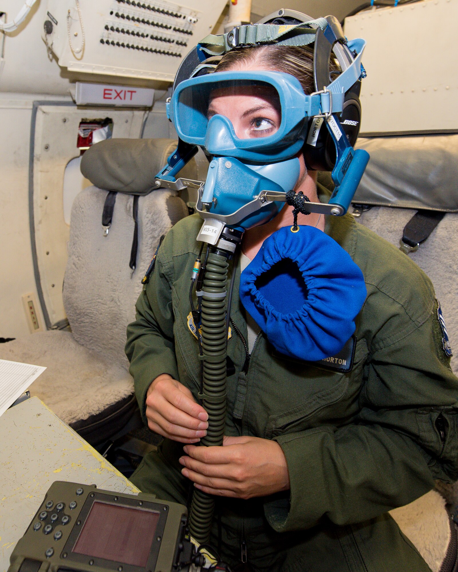 U.S. Air Force Staff Sgt. Jessica Horton, a communication systems technician with the 116th Air Control Wing (ACW), Georgia Air National Guard, tests her oxygen mask aboard an E-8C Joint STARS prior to a mission in the Boars Nest 2015 exercise, Robins Air Force Base, Ga., Aug. 20, 2015. The 116th ACW hosted the eighth annual Boars Nest Large Force Exercise bringing together more than 20 joint-force units and 55 different aircraft for aircrew training in a realistic land and maritime threat environment. Crews flying the E-8C Joint STARS manned platform, used their unique battle management, command and control, intelligence, surveillance and reconnaissance capabilities, integrated with other Air National Guard, Air Force, Navy, and Marine aircraft, to complete maritime and land-based missions during the exercise. (U.S. Air National Guard photo by Senior Master Sgt. Roger Parsons/Released)