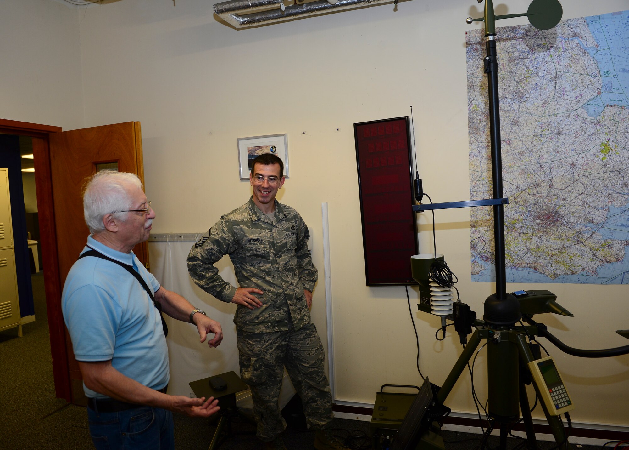 Former weather observer, Arthur Saiya, visited the 48th Operation Support Squadron to commemorate his 50th anniversary of being stationed at Royal Air Force Lakenheath, England Aug. 26, 2015. Saiya shared stories with Airmen, as well as pictures from his time at Lakenheath. (U.S. Air Force photo by Senior Airman Nigel Sandridge/Released)