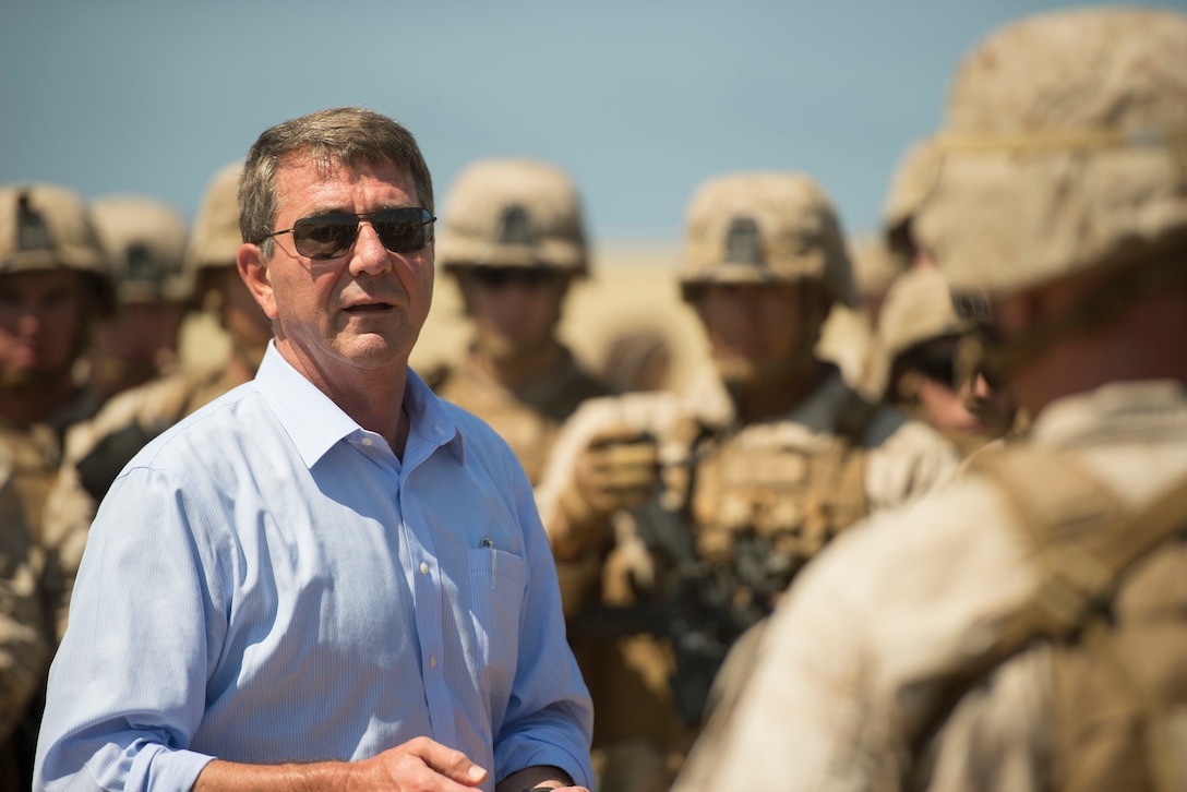 Defense Secretary Ash Carter takes a moment to speak with Marines following a room clearing demonstration during a visit to Camp Pendleton Calif., Aug. 27, 2015. DoD photo by U.S. Air Force Master Sgt. Adrian Cadiz