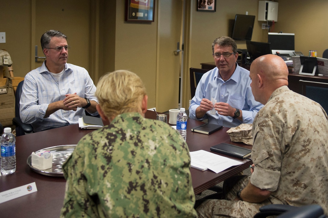 Defense Secretary Ash Carter, right, meets with Marine Corps Lt. Gen. David H. Berger, commanding general of the 1st Marine Expeditionary Force, and Marine Corps Rear Adm. Daniel Fillion, commander of Expeditionary Strike Group 3, as he arrives on Camp Pendleton Calif., Aug. 27, 2015. DoD photo by U.S. Air Force Master Sgt. Adrian Cadiz