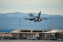 An F-16 Fighting Falcon assigned to the 457th Fighter Squadron at Naval Air Station Fort Worth Joint Reserve Base, Texas, takes off during Red Flag 15-4 at Nellis Air Force Base, Nev., Aug. 25, 2015. Active-duty, Guard and Reserve members from the Army, Navy, Marines and Air Force, along with air forces from other countries, participated in the exercise. (U.S. Air Force photo/Senior Airman Thomas Spangler) 