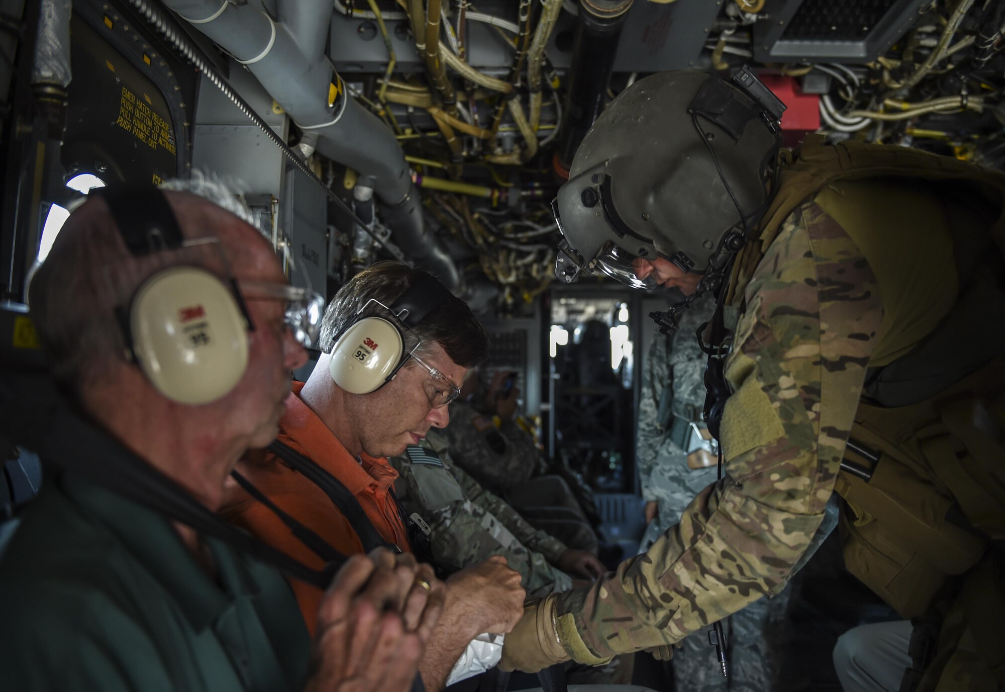 National civic leaders are strapped into a CV-22 Osprey at Hurlburt Field, Fla. Aug. 26, 2015. The hand-picked crew, with very limited military experience, if any, embedded with Special Tactics on a mock deployment. (U.S. Air Force photo by Airman 1st Class Ryan Conroy)