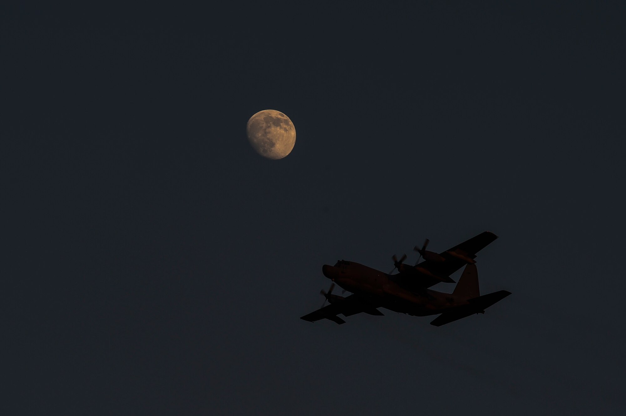 An AC-130H Combat Talon II flies past the flightline during an airfield seizure demonstration, Aug. 26, 2015, at Hurlburt Field Fla. More than 20 civic leaders toured Air Force Special Operations Command as part of the Secretary of Defense’s Senior Leader Engagement Program here. This program has exposed hundreds of national public opinion leaders to each branch of service since 1948, growing their knowledge in both military and national defense issues. (U.S. Air Force photo by Airman 1st Class Ryan Conroy)