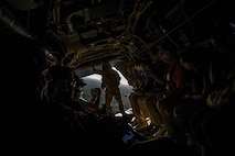 National civic leaders take video of an aerial gunner during a CV-22 Osprey flight at Hurlburt Field, Fla., Aug. 26, 2015. Peter Marx, City of Los Angeles chief technology officer, said the whole experience was humbling. “I never thought I would have the opportunity to be this close to military action,” he said on board the aircraft, referring to the pararescueman seated next to him. (U.S. Air Force photo by Airman 1st Class Ryan Conroy)