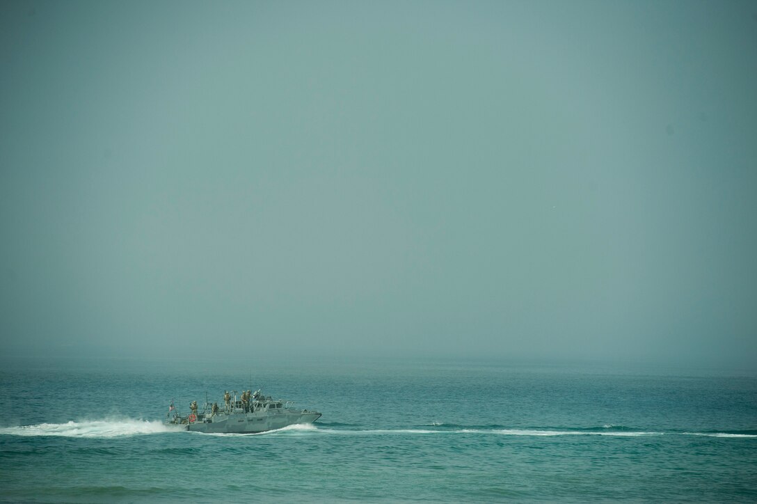 A Navy boat participates in a beach assault demonstration as Defense Secretary Ash Carter watches during a visit on Camp Pendleton Calif., Aug. 27, 2015. DoD photo by U.S. Air Force Master Sgt. Adrian Cadiz