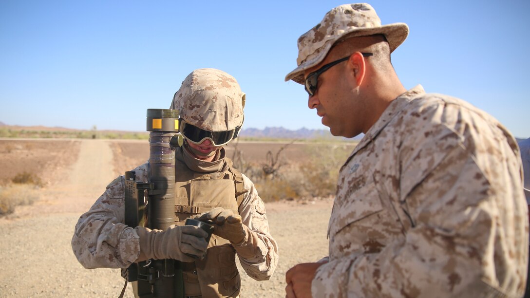 Pfc. Stephanie Brown, student, Low Altitude Air Defense Gunner’s Course 3-15, performs the 13 critical checks on the FIM-92 Stinger Missile, prior to firing it as part of the class’ culminating exercise aboard Yuma Proving Ground, Ariz., Aug. 22, 2015. The purpose of the 13 critical checks is to ensure the issued weapon is ready and functional with no discrepancies. (Official Marine Corps photo by Cpl. Charles Santamaria/ Released)