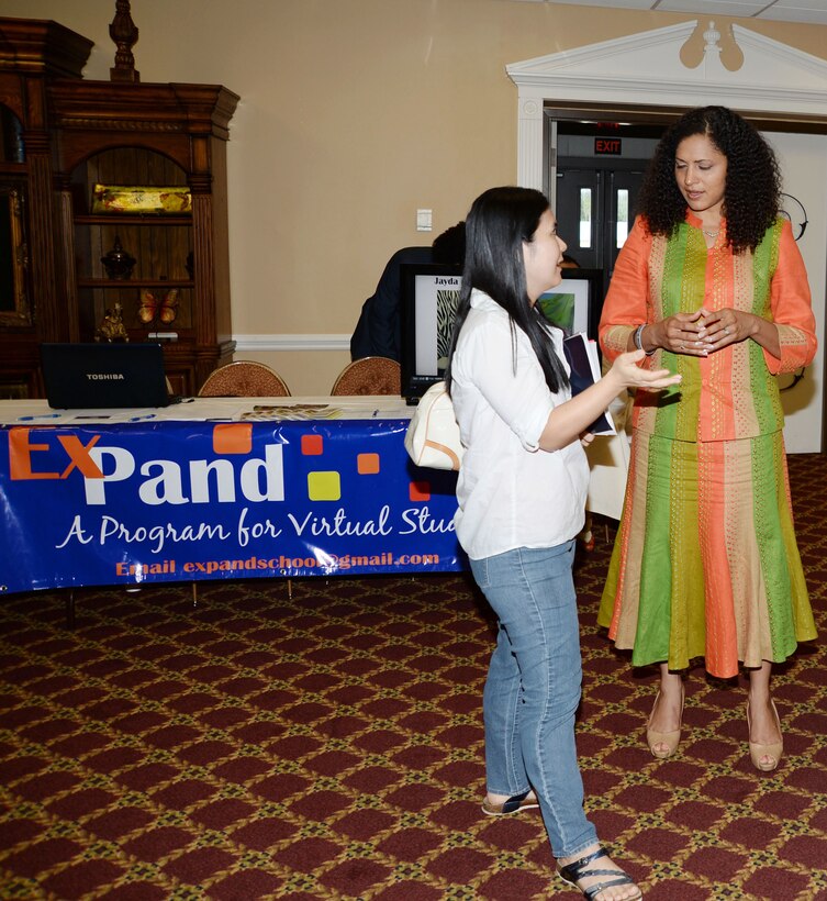 Dr. Lillian Rambeau, (right) administrator, Jayda Lives, Inc. and the ExPand Program, discusses some of the benefits and advantages of the Dual Enrollment/Dual Credit and virtual/online programs during the Tools for Schools event at Marine Corps Logistics Base Albany’s Town and Country Grand Ballroom, recently. Rambeau’s daughter, Jayda Robinson, graduated from college, at the age of 17, with an associate’s degree while still in high school. She recently graduated from Florida State University, Tallahassee, Florida, with a Bachelor of Science degree at age 19.
