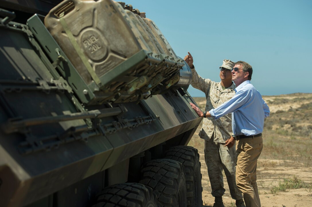 Defense Secretary Ash Carter receives a tour of an armored vehicle during his visit on Camp Pendleton Calif., Aug. 27, 2015. DoD photo by U.S. Air Force Master Sgt. Adrian Cadiz