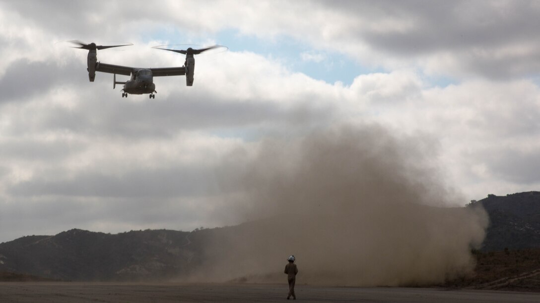 An MV-22B Osprey with Marine Medium Tiltrotor Squadron (VMM) 166 (Reinforced) lands to conduct egress training with Marines from 2nd Battalion, 1st Marine Regiment (Reinforced), aboard Marine Corps Base Camp Pendleton, Calif., Aug. 18. Marines conducted the training as part of the 13th Marine Expeditionary Unit predeployment training. 