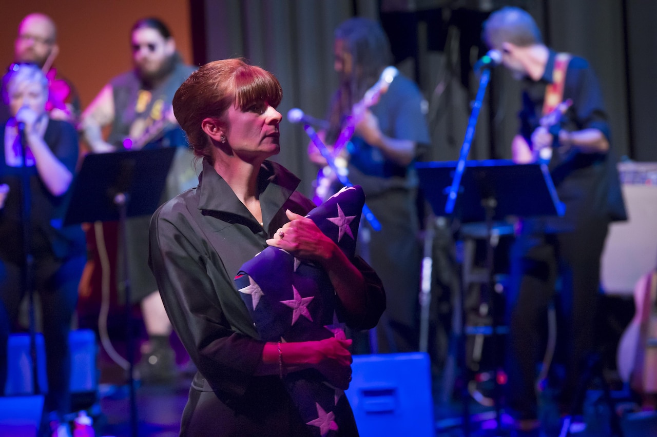 An actress portrays a service member's widow in the play "I Will Wait," in Fort Wayne, Ind., Aug. 1, 2015. The play tells the story of several military spouses across several time periods, from the World War II era to present day. Courtesy photo by Tim Brumbeloe, used by permission