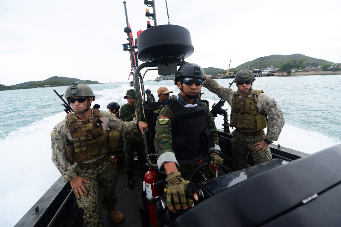 U.S. sailors and members of the Thai navy's riverine patrol regiment train on a special operations craft during Cooperation Afloat Readiness and Training Thailand 2015 in Sattahip, Thailand, Aug. 27, 2015. The U.S. sailors are assigned to Coastal Riverine Squadron 4. In its 21st year, the annual exercise includes the U.S. Navy, U.S. Marine Corps and the armed forces of nine partner nations. U.S. Navy photo by Petty Officer 1st Class Joshua Scott