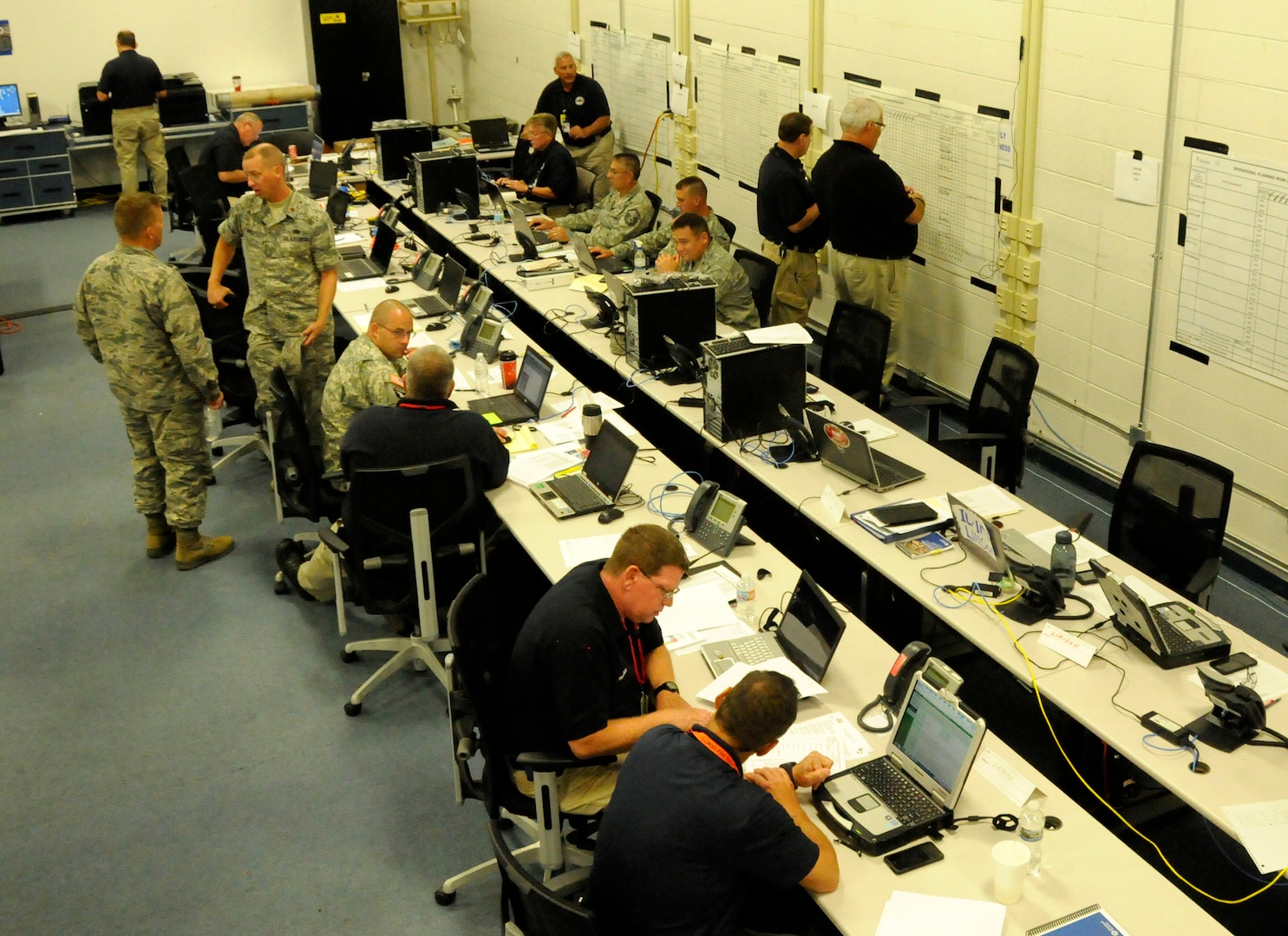 Members of the Illinois National Guard team up with the Illinois Emergency Management Agency in a simulated response to a major earthquake in the central U.S. The week-long exercise took place at the 183d Fighter Wing in Springfield, Illinois, and concluded on Aug. 28, 2015. More than 220 military members and over 100 civilian emergency management personnel from multiple agencies participated in the exercise known as Prairie Assurance. The exercise was designed to strengthen partnerships at all levels. (U.S. Air National Guard photo by Tech. Sgt. Todd Pendleton)
