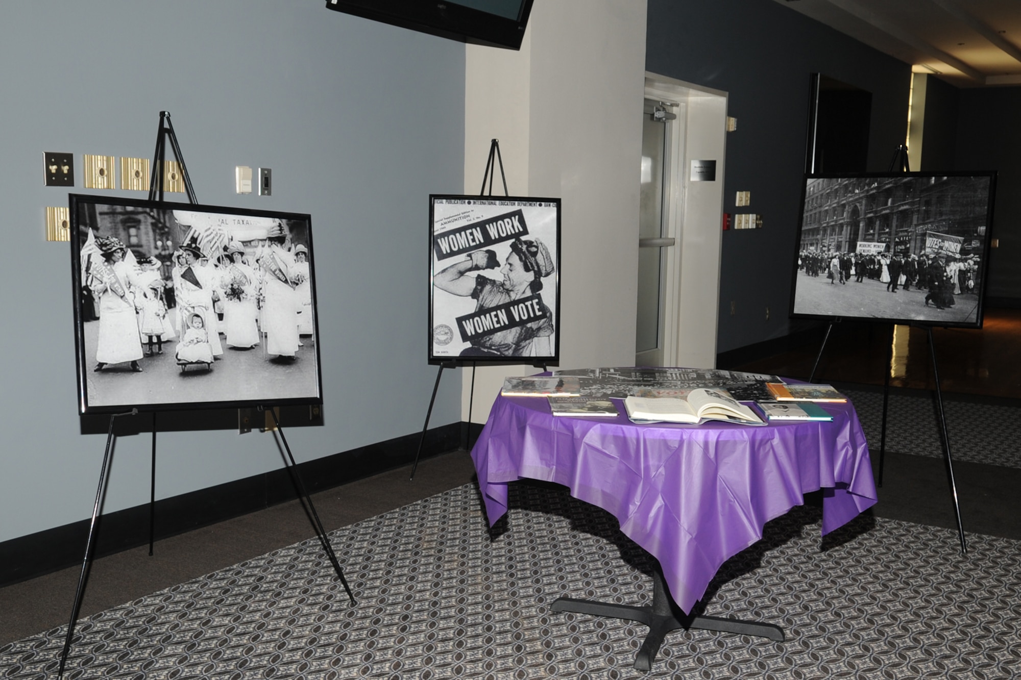 Posters of historical events are displayed during a Women’s Equality Day brunch at the Event Center on Goodfellow Air Force Base, Texas, Aug. 26, 2015. The brunch celebrated the 95th anniversary of the 19th Amendment, granting women the right to vote. (U.S. Air Force photo by Staff Sgt. Laura R. McFarlane/Released)