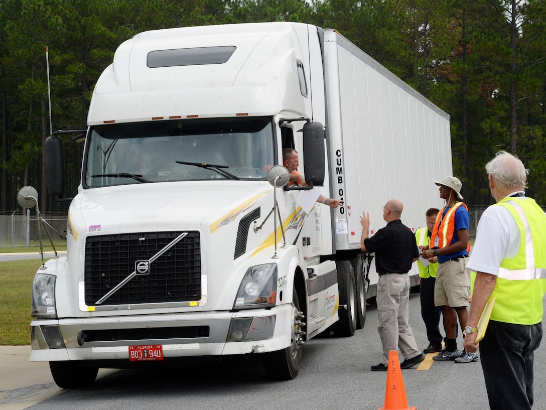 Federal Emergency Management Agency officials pre-stage about 75 trailers at Marine Corps Logistics Base Albany’s Civilian Human Resources Office — Southeast parking lot, in preparation for Tropical Storm Erika, which is forecast to hit Florida, Aug. 31. The FEMA trailers contain emergency supplies - primarily food, water and power generation equipment that may be needed in the event the storm makes landfall early next week and impacts Georgia, or any of its neighboring states, to include Florida and South Carolina.