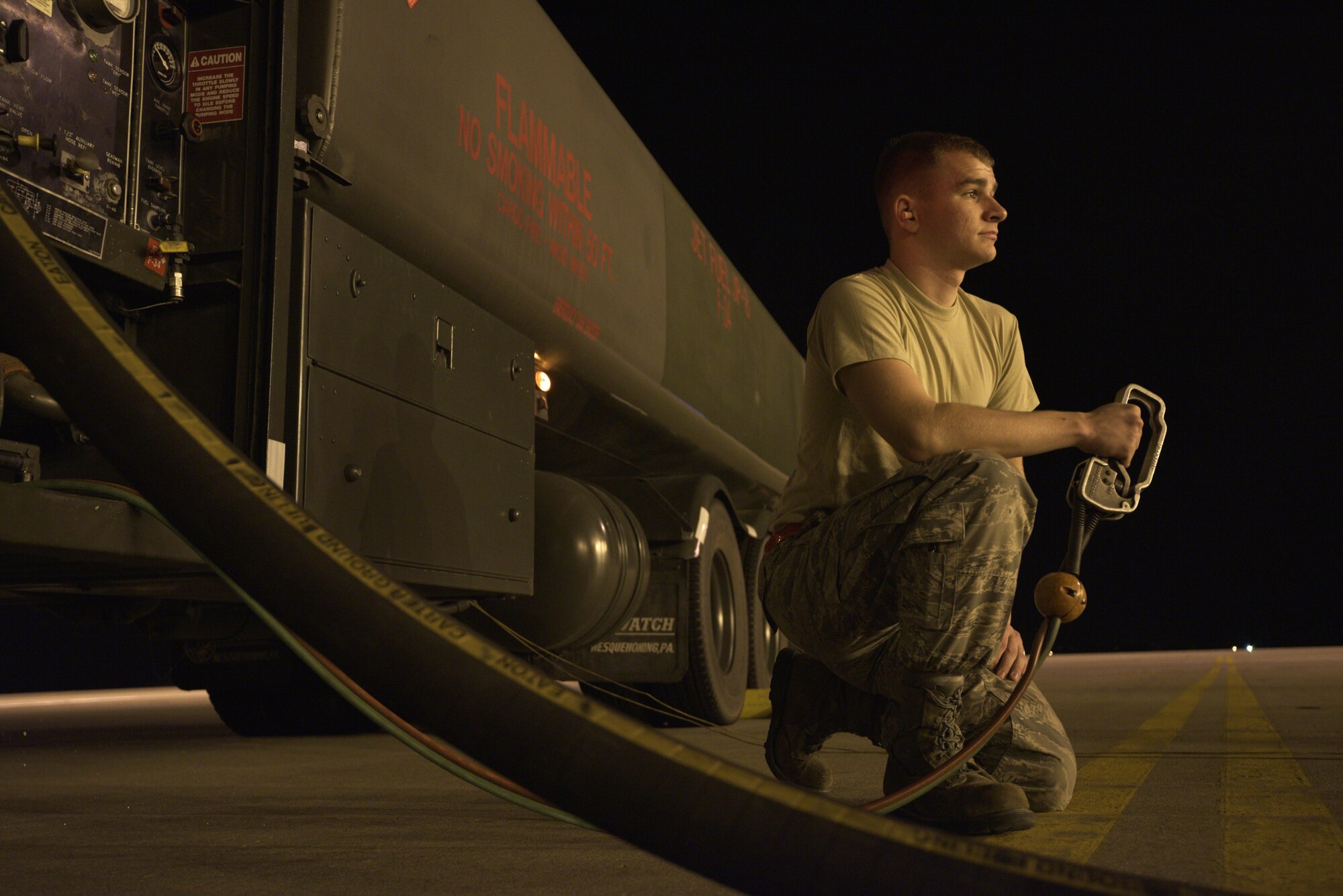 U.S. Air Force Airman 1st Class Andrew Chanders, 35th Logistics Readiness Squadron fuels distribution operator, pumps fuel into a RQ-4 Global Hawk at Misawa Air Base, Japan, Aug. 19, 2015. The RQ-4 has one of the highest endurance capabilities for unrefueled flight, with an ability to stay in the sky for more than 30 hours at a time on a full tank of fuel. (U.S. Air Force photo by Senior Airman Jose L. Hernandez-Domitilo/Released)