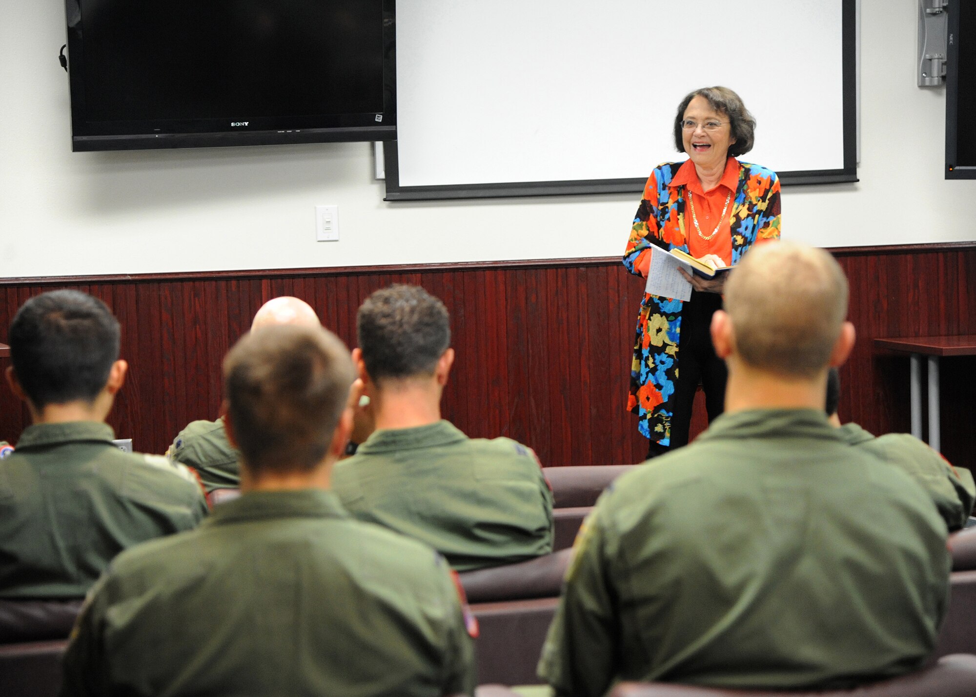 Cynthia Chennault, University of Florida-Gainesville professor of Chinese, speaks during the 435th Fighter Training Squadron library dedication Aug. 28, 2015 at Joint Base San Antonio-Randolph. The library is dedicated in honor of her father, Lt. Gen. Claire Chennault, commander of the famed first American volunteer group in China during the early years of World War II, better known as the Flying Tigers.  (U.S. Air Force photo by Melissa Peterson/released)